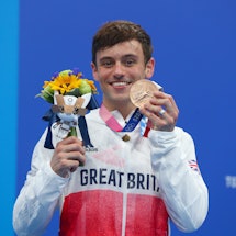 Thomas Daley of Great Britain poses during the awarding ceremony after the men's 10m platform final ...