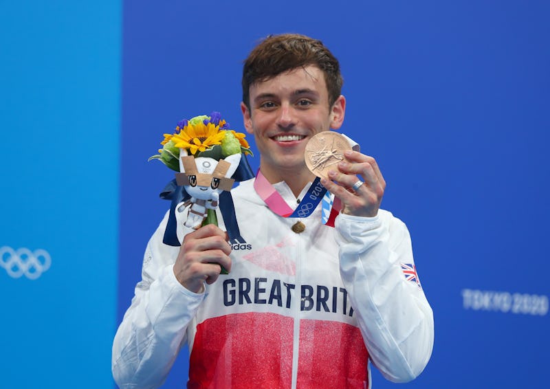 Thomas Daley of Great Britain poses during the awarding ceremony after the men's 10m platform final ...