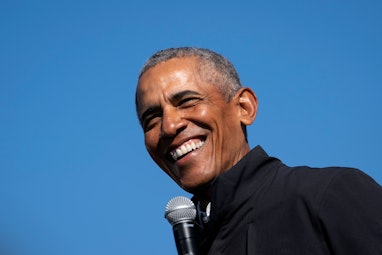 FLINT, MI - OCTOBER 31: Former U.S. President Barack Obama speaks during a drive-in campaign rally f...