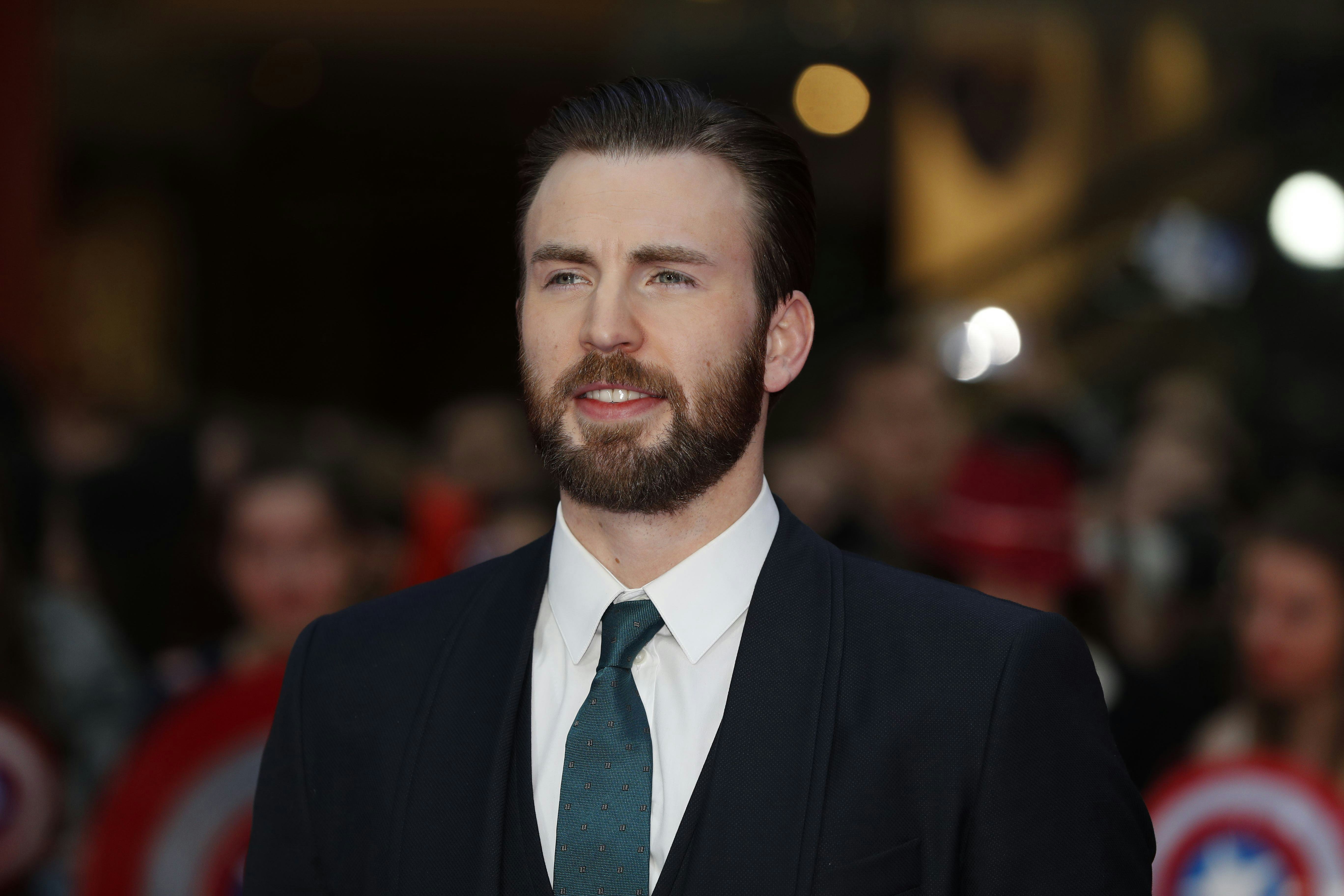US actor Chris Evans poses on the red carpet arriving for the European Premiere of the film Captain ...