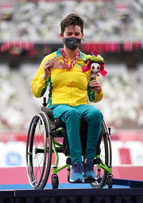 Australia's Robyn Lambird poses with her bronze medal after finishing third in the Women's 100 metre...