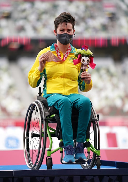 Australia's Robyn Lambird poses with her bronze medal after finishing third in the Women's 100 metre...