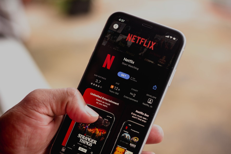 BRAZIL - 2021/03/16: In this photo illustration the Netflix logo in App Store seen displayed on a sm...