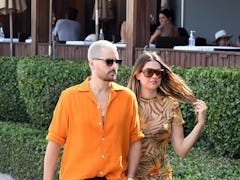 MIAMI FL - APRIL 7: Scott Disick and Amelia Hamlin are seen walking at the beach on April 7, 2021 in...