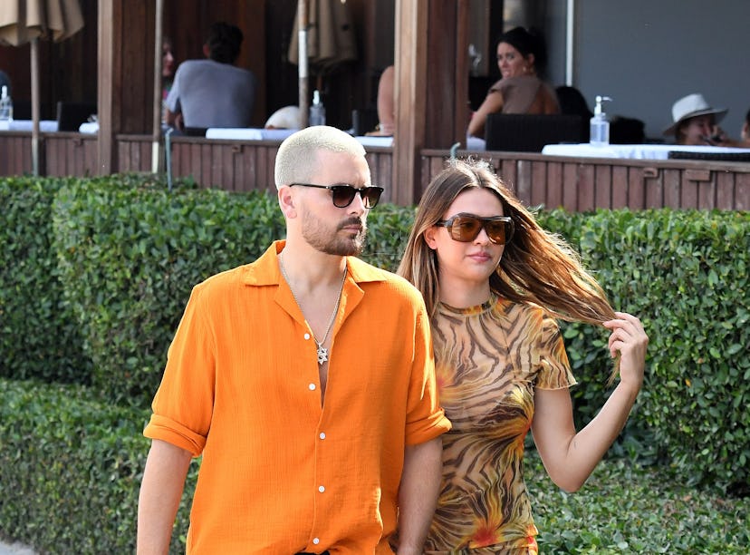 MIAMI FL - APRIL 7: Scott Disick and Amelia Hamlin are seen walking at the beach on April 7, 2021 in...