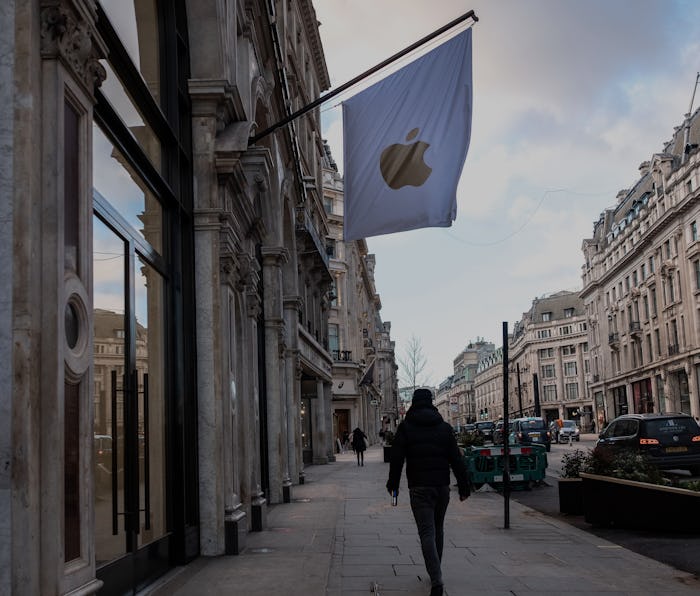 LONDON, UNITED KINGDOM - 2021/02/10: A man walking past the Apple stores  in London, during the thir...