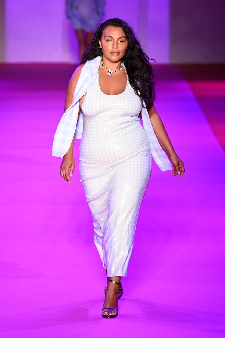 A model walking the runway in a white dress by Brandon Maxwell during NYFW Spring 2022