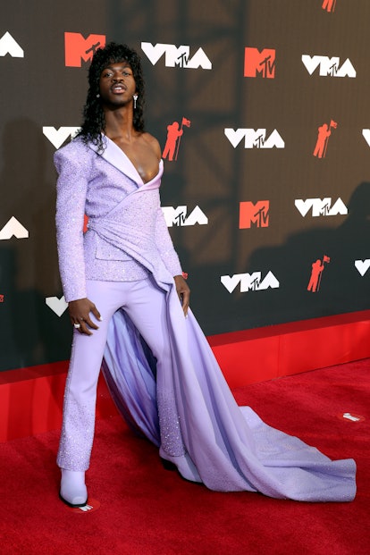 The VMAs 2021 red carpet fashion was truly wild, from Lil Nas X's cape to Doja Cat's lace. Here are ...