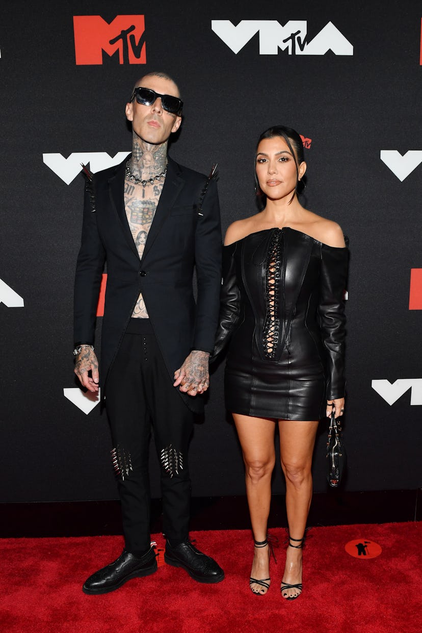 NEW YORK, NEW YORK - SEPTEMBER 12: (L-R) Travis Barker and Kourtney Kardashian attend the 2021 MTV V...