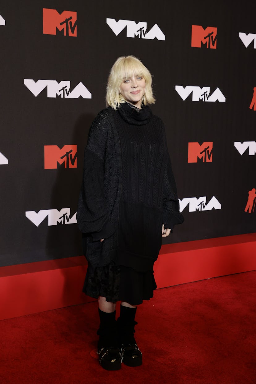 Billie Eilish's 2021 MTV VMAs look is an oversized sweater dress witha  chunky knit and turtleneck