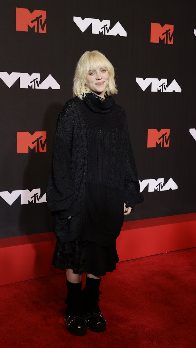 Billie Eilish's 2021 MTV VMAs look is an oversized sweater dress witha  chunky knit and turtleneck