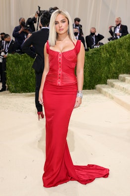 Addison Rae's Met Gala 2021 look was a stunning red gown, drawing inspiration from Britney Spears' d...