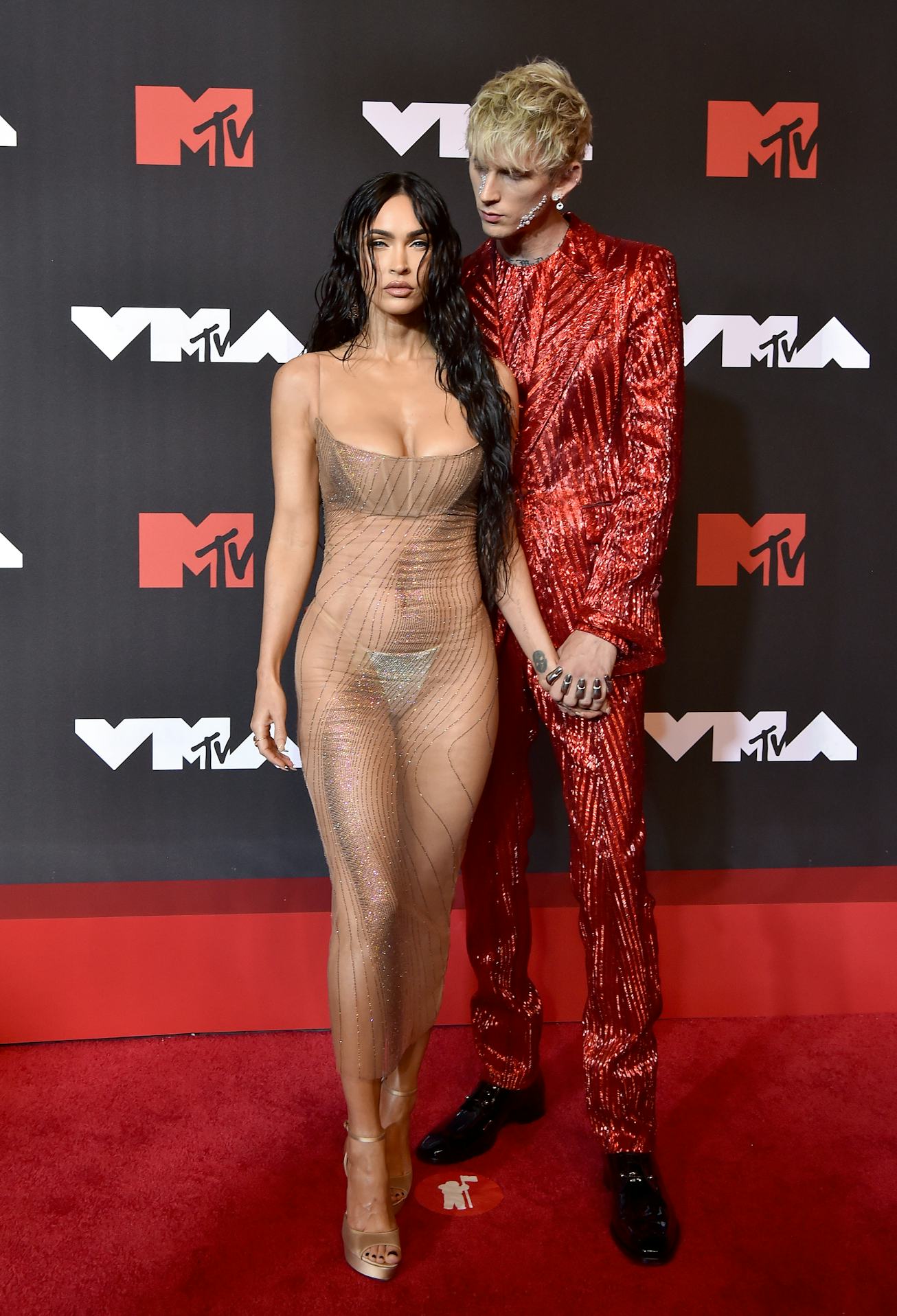 NEW YORK, NEW YORK - SEPTEMBER 12: Megan Fox and Machine Gun Kelly attend the 2021 MTV Video Music A...