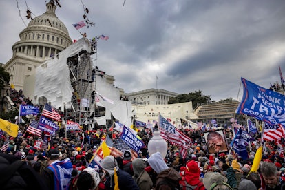 Trump supporters clash with police and security forces as people try to storm the US Capitol on Janu...