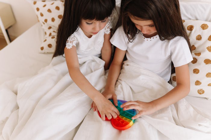 These Instagram captions for pictures of your kids getting along are perfect.