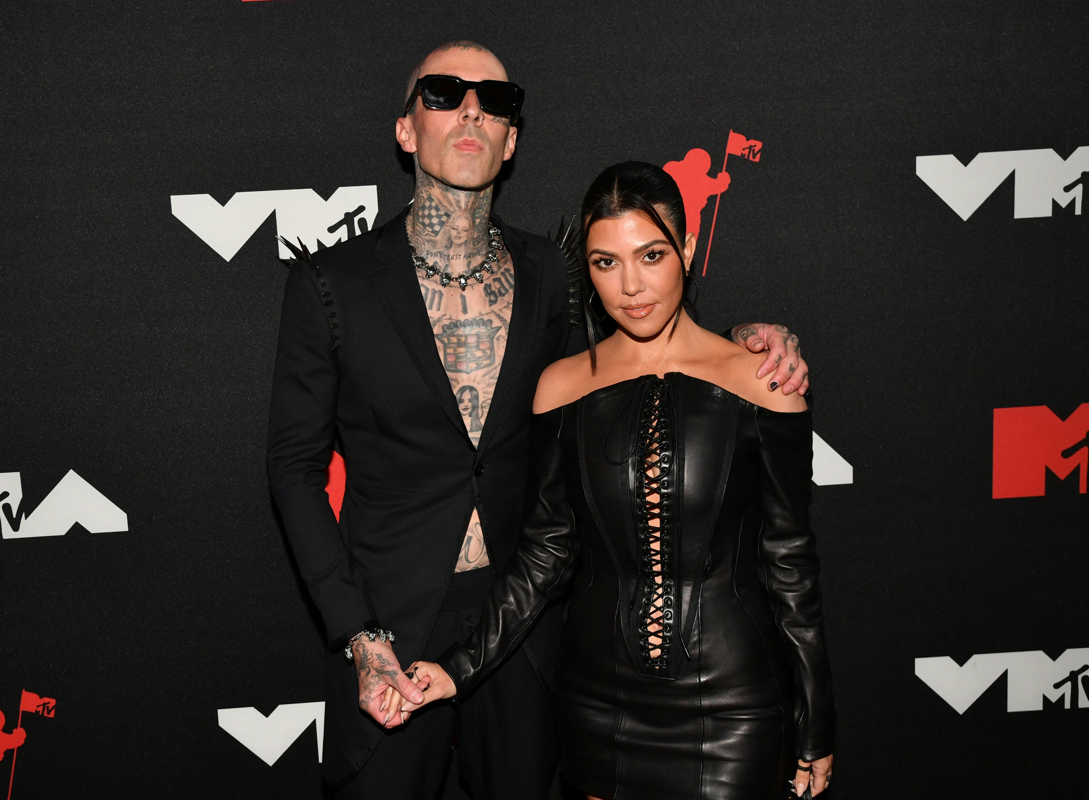 NEW YORK, NEW YORK - SEPTEMBER 12: (L-R) Travis Barker and Kourtney Kardashian attend the 2021 MTV V...