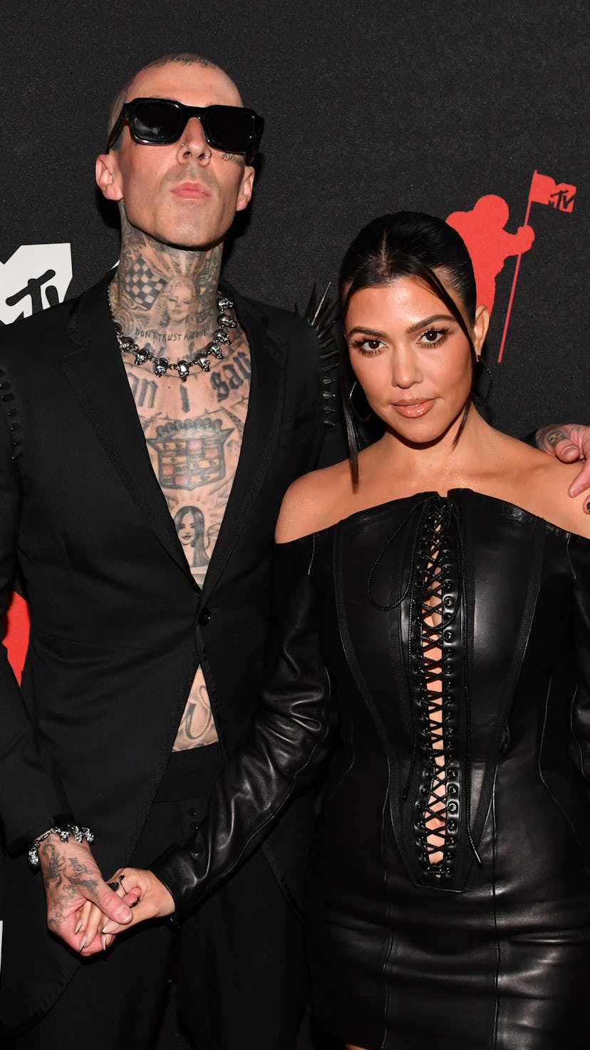 NEW YORK, NEW YORK - SEPTEMBER 12: (L-R) Travis Barker and Kourtney Kardashian attend the 2021 MTV V...