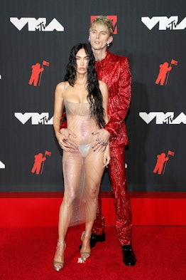 Megan Fox and Machine Gun Kelly’s VMAs body language was intense.