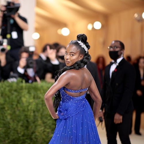 Amanda Gorman's Met Gala 2021 look was a breath of fresh air and bold color on the red carpet. And h...