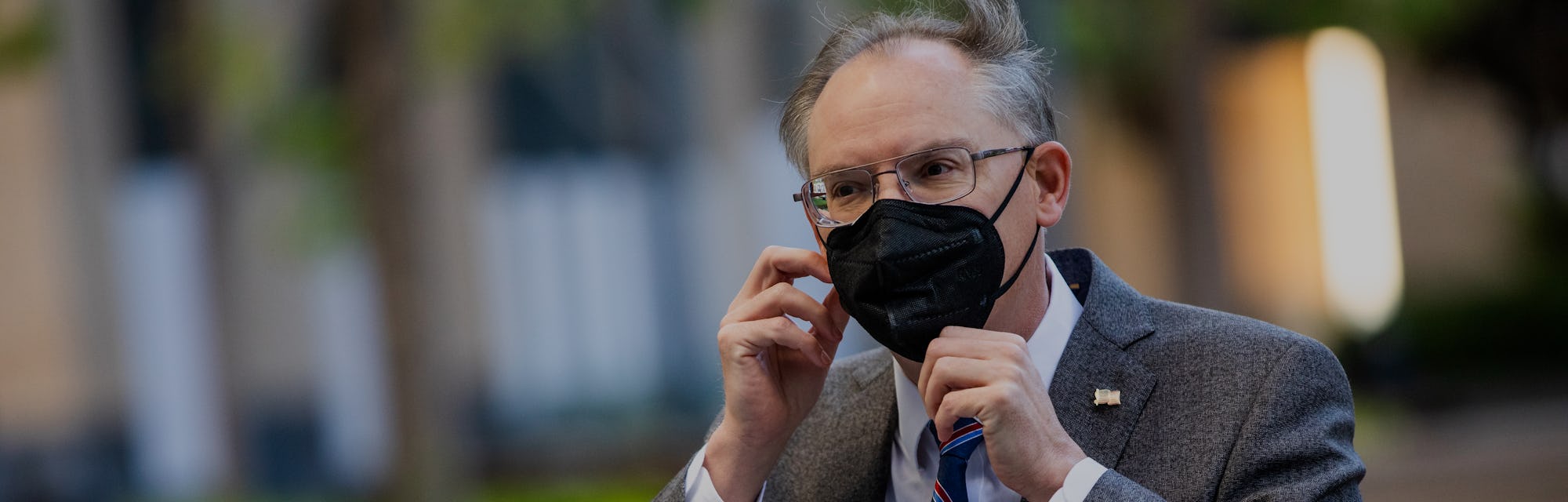 OAKLAND, CA - MAY 20: Epic Games CEO Tim Sweeney dons a mask as he arrives at the United States Dist...