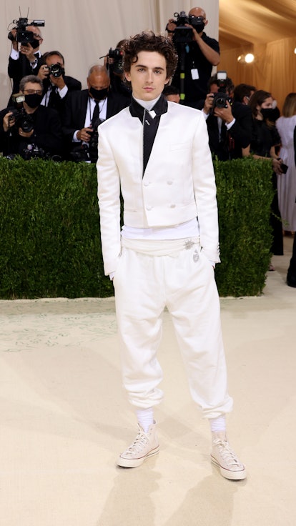 Met Gala co-chair Timothée Chalamet attended the 2021 Met Gala in a Haider Ackermann suit and Conver...