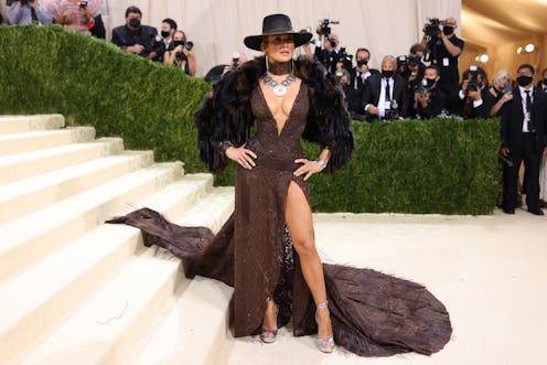 Jennifer Lopez's Met Gala 2021 look, designed by Ralph Lauren, channeled a glamorous cowgirl. 