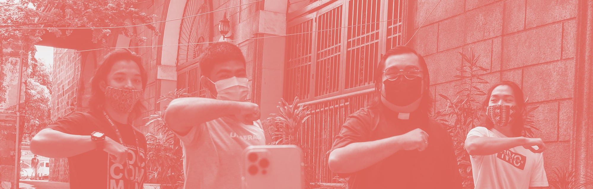 This photo taken on April 8, 2021 shows Philippine priest Father Paul Woo (2nd R) learning a dance f...