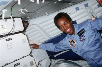 African American astronaut Guion 'Guy' Bluford smiles while serving as Mission Specialist on the Spa...