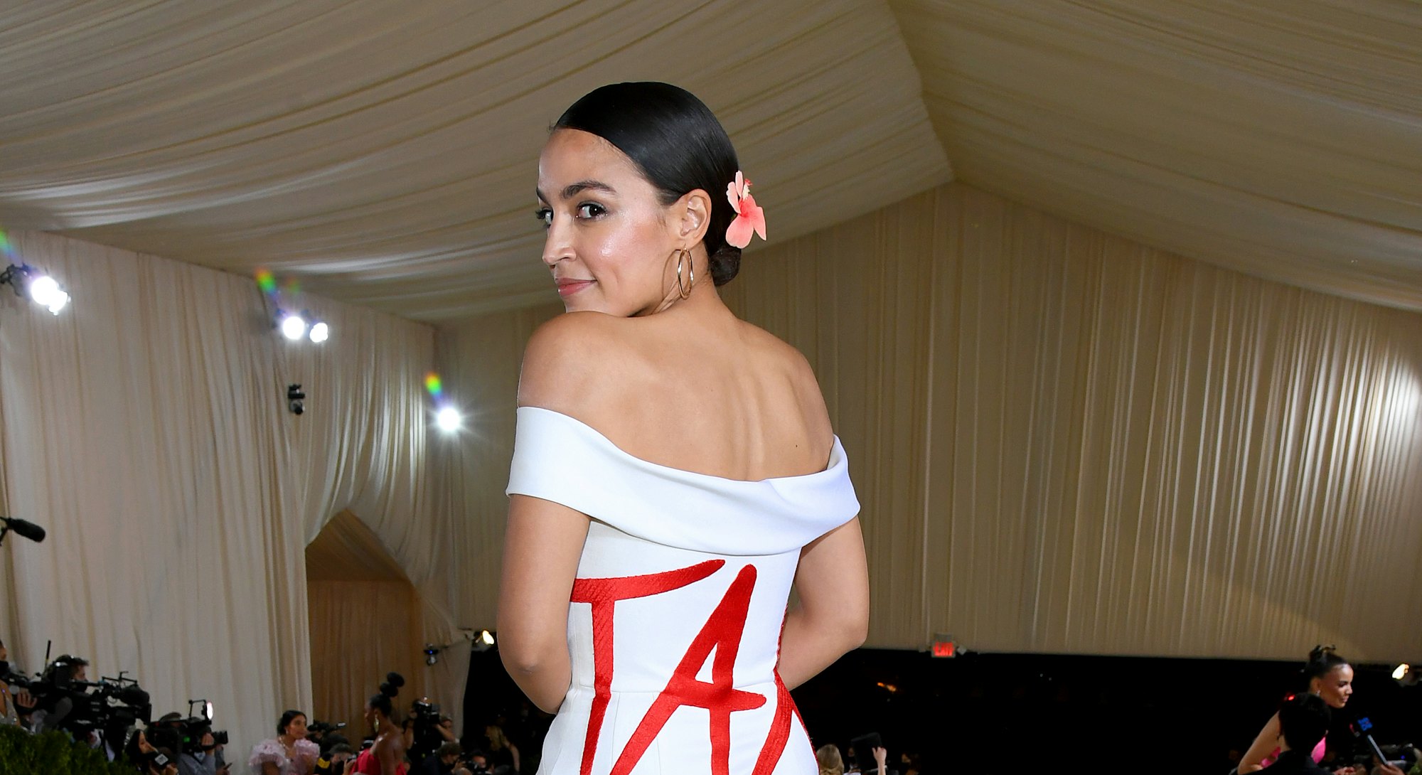 The Met Gala 2021 red carpet was full of political statements, from AOC's "Tax The Rich" dress to Me...