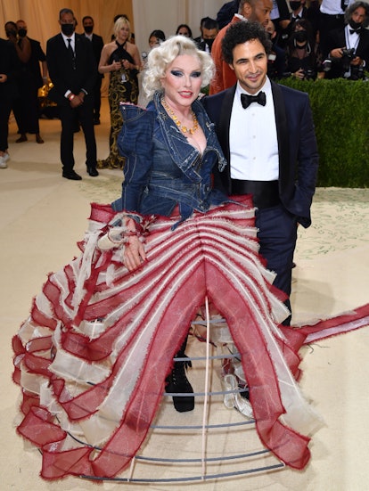 US singer Debbie Harry (L) and designer Zac Posen arrive for the 2021 Met Gala at the Metropolitan M...