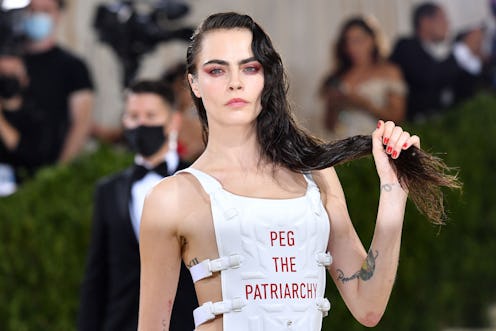 TOPSHOT - English model Cara Delevingne arrives for the 2021 Met Gala at the Metropolitan Museum of ...