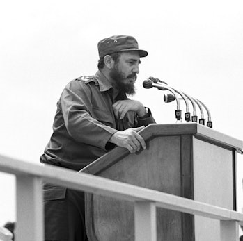 Cuban president Fidel Castro gives a speech at a public meeting in Cienfuegos in front of head of th...
