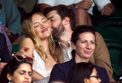 Roxy Horner and Jack Whitehall in the stands on centre court as they watch the match between Cameron...