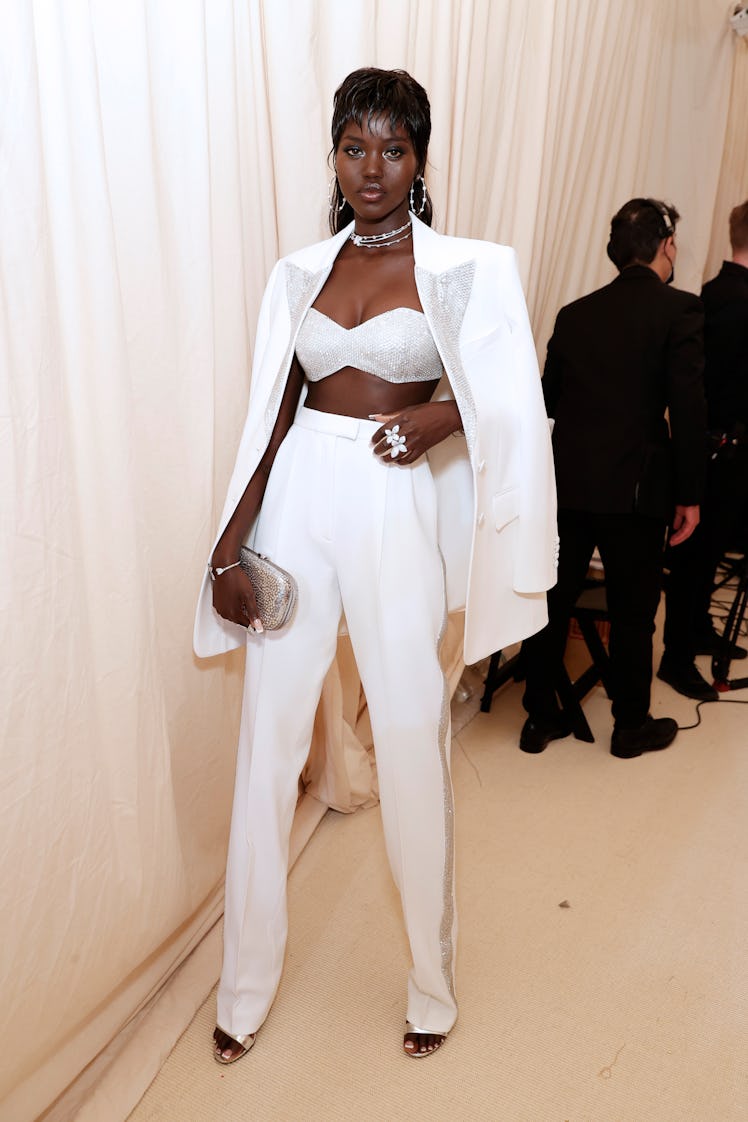 NEW YORK, NEW YORK - SEPTEMBER 13: Adut Akech attends The 2021 Met Gala Celebrating In America: A Le...