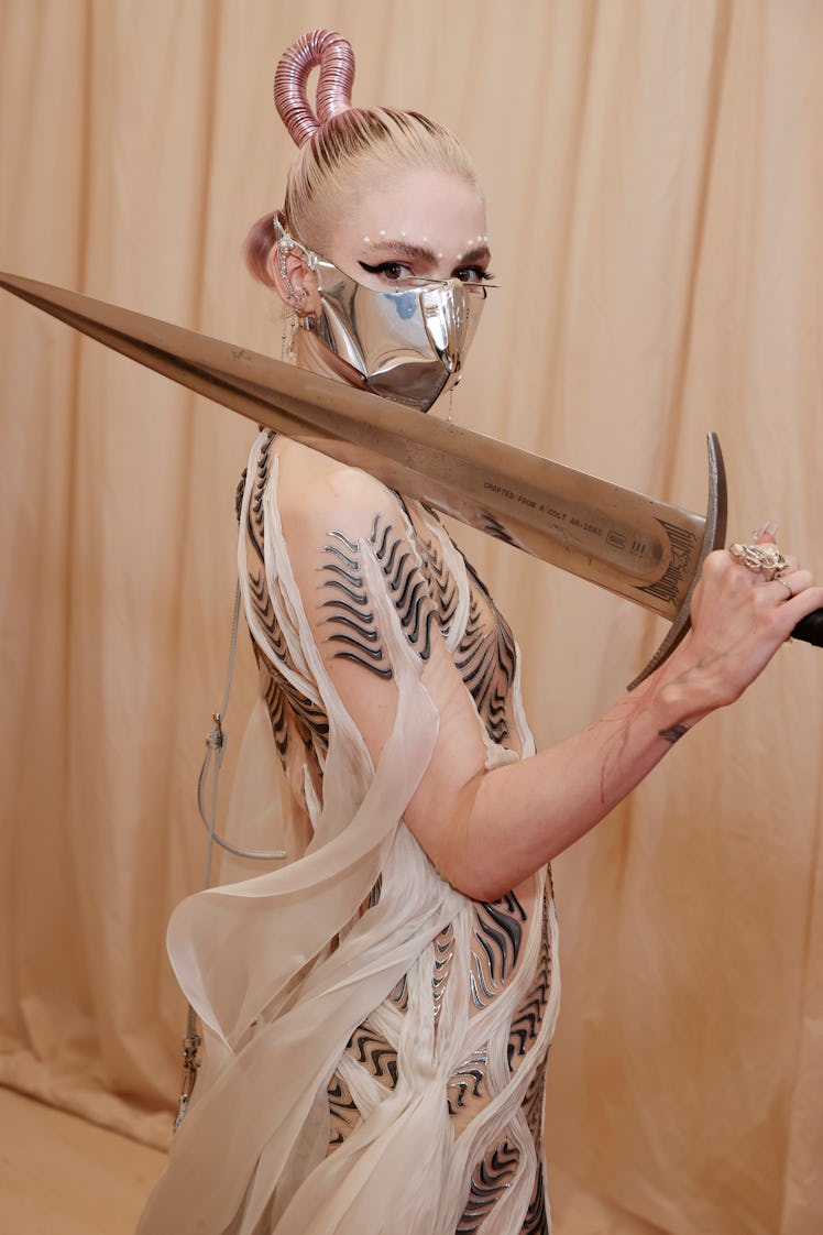 NEW YORK, NEW YORK - SEPTEMBER 13: Grimes attends The 2021 Met Gala Celebrating In America: A Lexico...