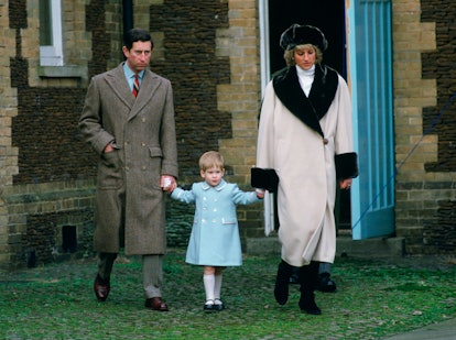Prince Charles, Prince Harry, and Princess Diana holding hands as they arrive for a photocall at San...