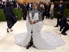 Simone Biles in an 88 pound dress at The 2021 Met Gala 
