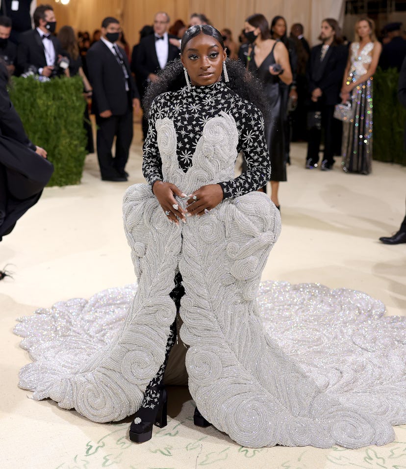 Simone Biles in an 88 pound dress at The 2021 Met Gala