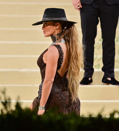 Jennifer Lopez's Met Gala 2021 hair was meant to mimic a horse's tail, fitting in with her Wild West...