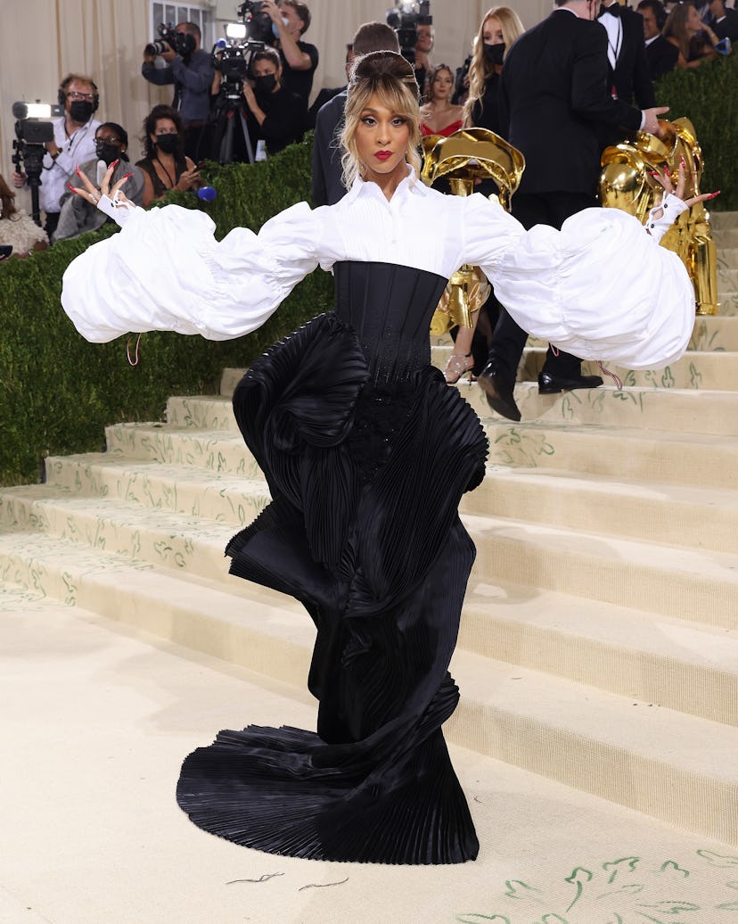 Mj Rodriguez wears Thom Browne to the 2021 Met Gala benefit "In America: A Lexicon of Fashion" on Se...