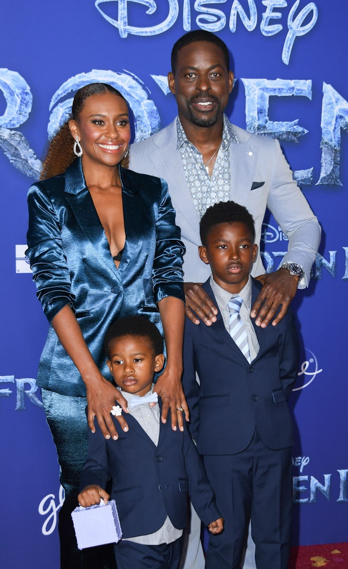 US actor Sterling K. Brown, his wife actress Ryan Michelle Bathe and their two sons Andrew (R) and A...
