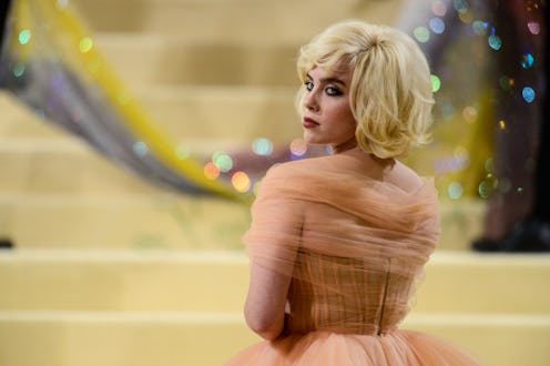 Billie Eilish's Met Gala 2021 looks included a cape, sheer dress that she changed into later in the ...