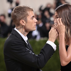 Justin Bieber appears to be consoling Hailey Bieber at the 2021 Met Gala right before she put on her...