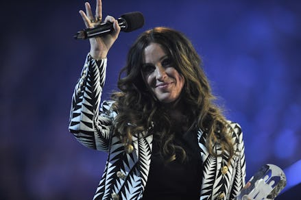 HAMILTON, ON - MARCH 15:  Alanis Morissette is presented an award at the 2015 JUNO Awards at FirstOn...