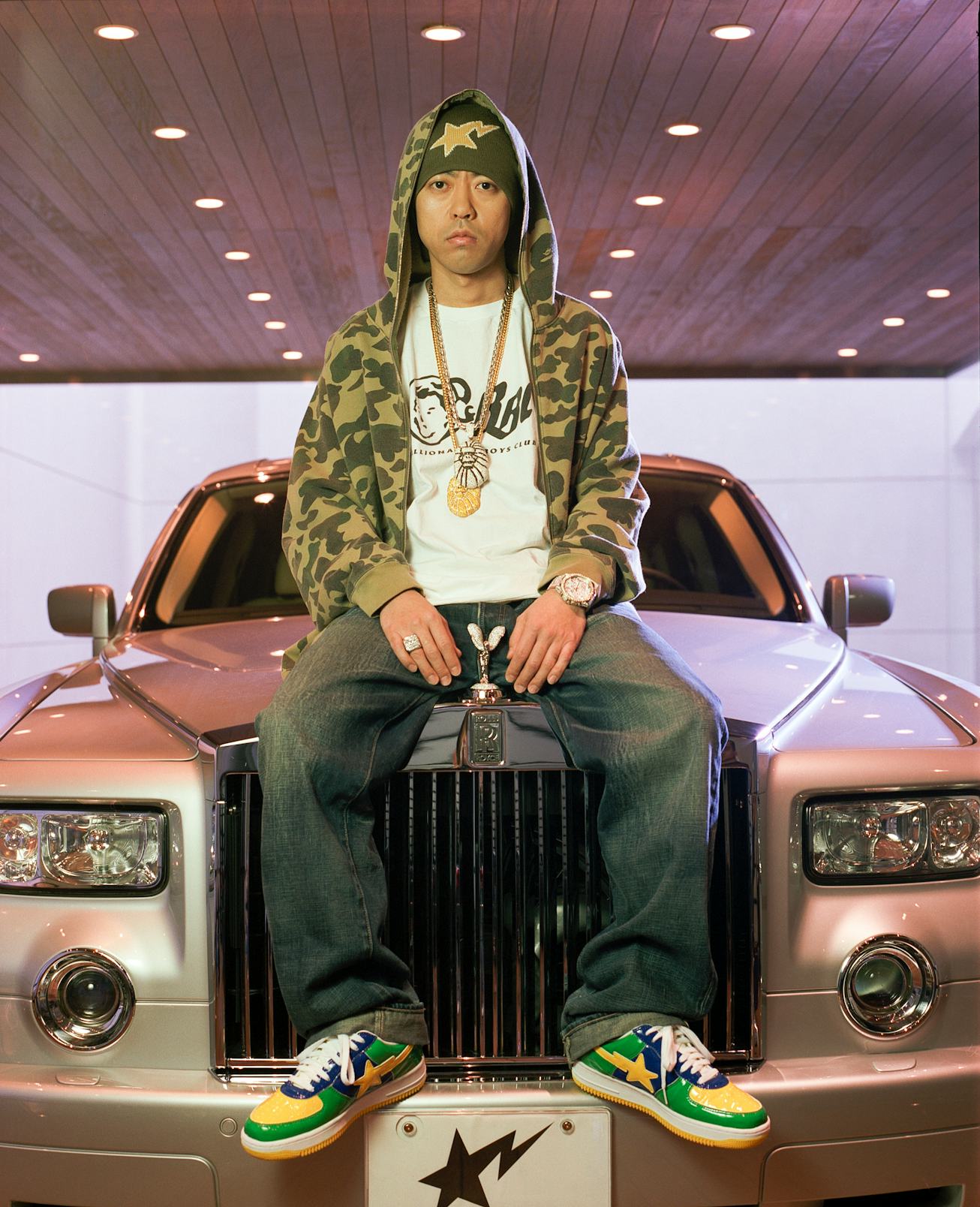 Japanese fashion designer, Nigo, poses with his Rolls Royce in February, 2004 in Shibuya, Tokyo. (...