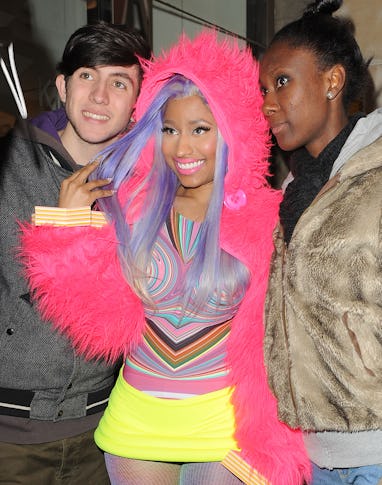 LONDON, ENGLAND - APRIL 20: Nicki Minaj leaves the Kiss 100 studios on April 20, 2012 in London, Eng...