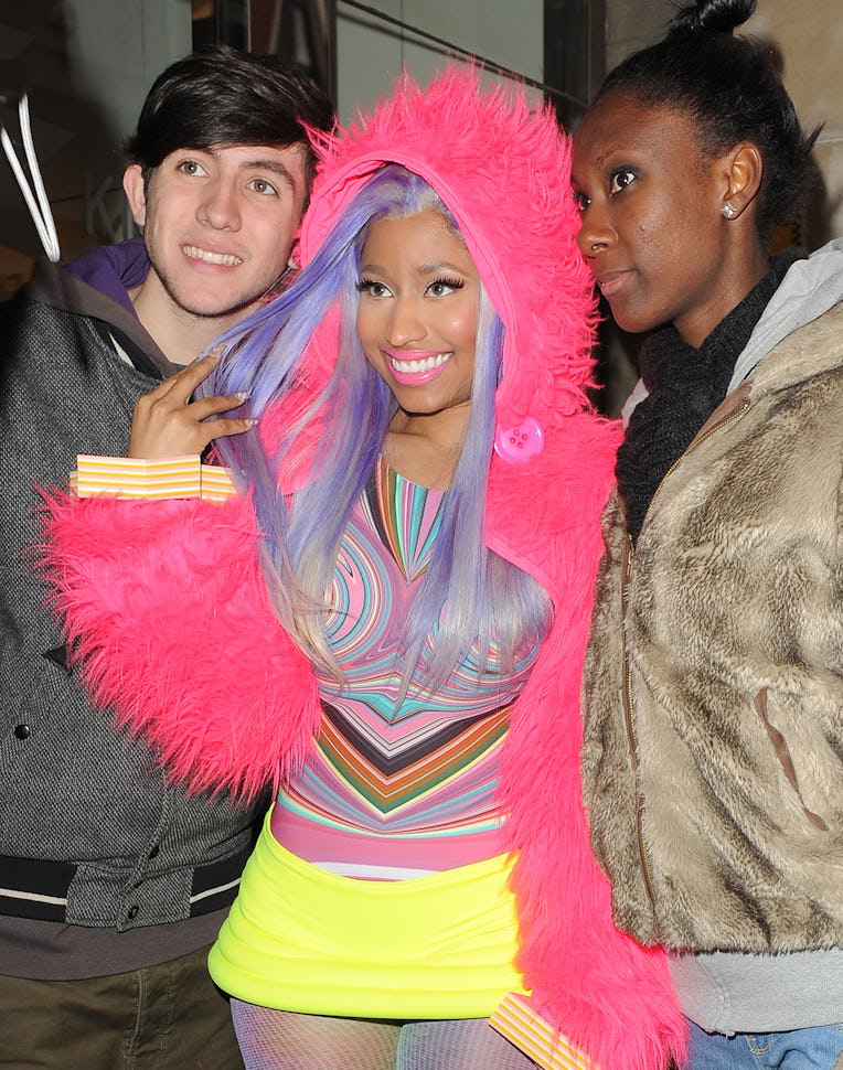 LONDON, ENGLAND - APRIL 20: Nicki Minaj leaves the Kiss 100 studios on April 20, 2012 in London, Eng...
