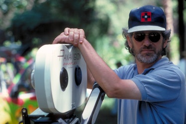 American director Steven Spielberg poses with a Panaflex camera on the set of the film 'Jurassic Par...