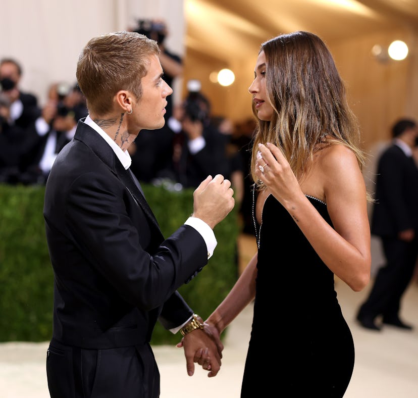 NEW YORK, NEW YORK - SEPTEMBER 13: Justin Bieber consoles wife Hailey Baldwin at The 2021 Met Gala w...