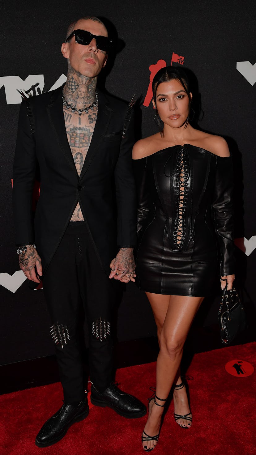 NEW YORK, NEW YORK - SEPTEMBER 12: (L-R) Travis Barker and Kourtney Kardashian attend the 2021 MTV V...